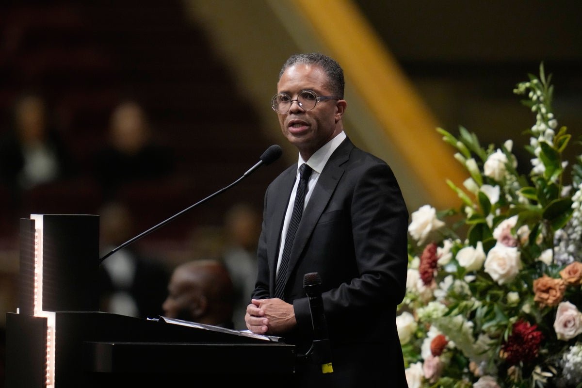Jesse Jackson's son speaking out against ex-presidents at funeral, surrounded by mourners and media, with a mix of tributes and tensions in the air, as the primary keyword 'ex-presidents' is highlighted