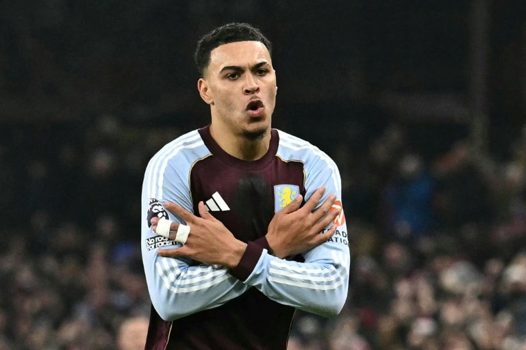Aston Villa players in action against Chelsea