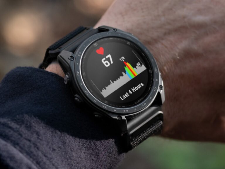 A close-up of a Garmin smartwatch with a new update installed, showcasing the latest features and improvements in the UK smartwatch market, with a focus on user experience and beta software