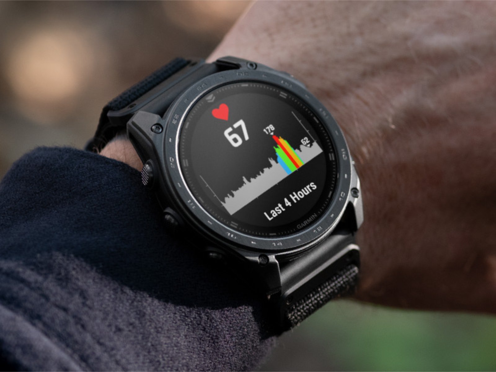 A close-up of a Garmin smartwatch with a new update installed, showcasing the latest features and improvements in the UK smartwatch market, with a focus on user experience and beta software