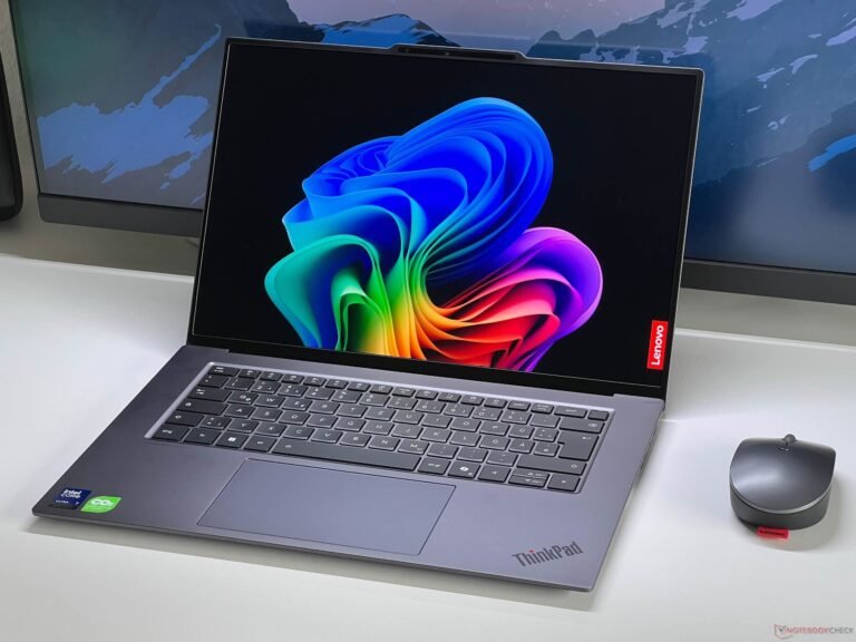 A person in the UK holding a laptop with a concerned expression, surrounded by graphs and charts indicating rising component costs and laptop prices