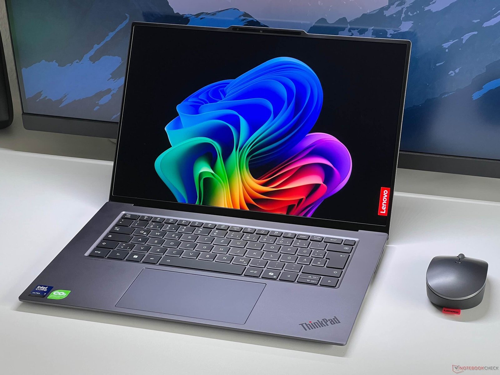 A person in the UK holding a laptop with a concerned expression, surrounded by graphs and charts indicating rising component costs and laptop prices