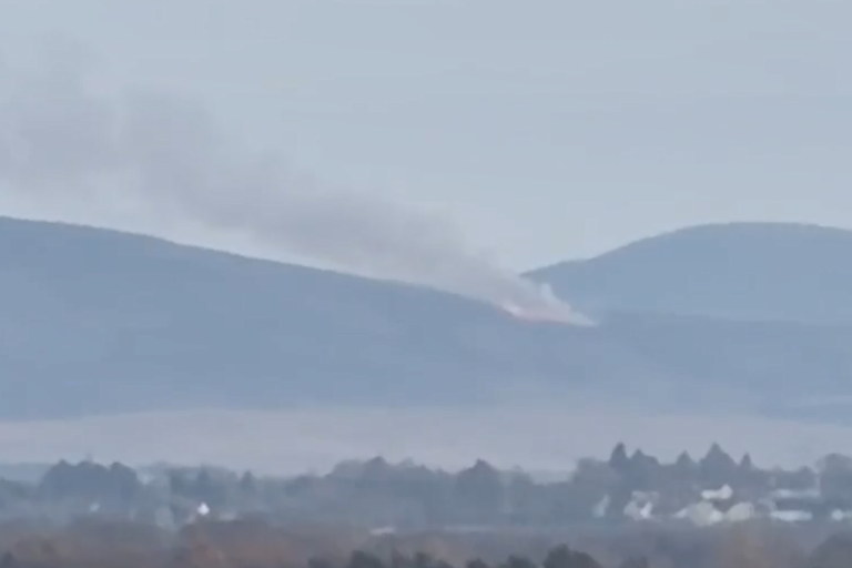 Aerial view of the Pentland Hills fire, with thick smoke billowing into the air, as firefighters work to contain the blaze in the Scottish countryside, near Edinburgh
