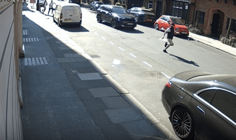 A luxury watch, similar to the one stolen in the Mayfair robbery, with a leather strap and intricate details, symbolising the high value of the item and the motivations behind the crime, a significant incident in the Mayfair area