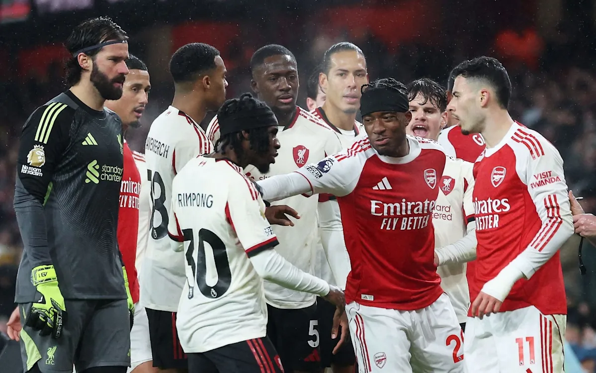 Arsenal players in action during Premier League match