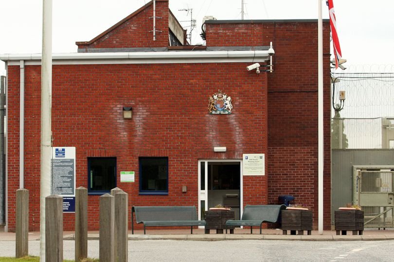 A prison officer stands guard outside a Nottinghamshire jail, where an inmate stabbed a officer in a horrific attack, highlighting concerns about prison safety and inmate behaviour