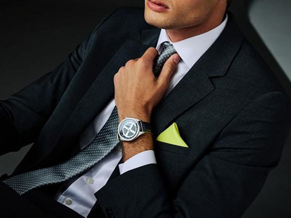 The Citizen X-Men watch features a black and silver design with colourful accents, powered by Eco-Drive movement, a technological innovation that harnesses energy from any light source, making it a sustainable and reliable choice for watch enthusiasts in the UK, with a focus on superhero watches and Marvel collaborations