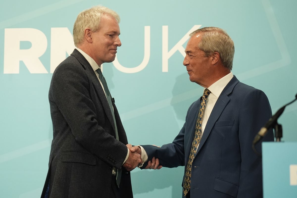 Nigel Farage speaking at a podium, with a backdrop of the UK flag, amidst controversy surrounding the 'unregulated sexual economy' and the need for regulation and safety in the sex industry