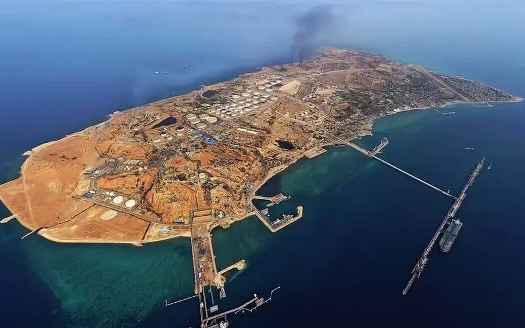 Aerial view of a small island in the Middle East, with a US flag and an Iranian flag in the foreground, symbolising the complex US-Iran relations and the potential for diplomatic solutions