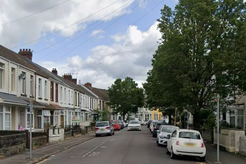 UK police arresting balaclava clad men