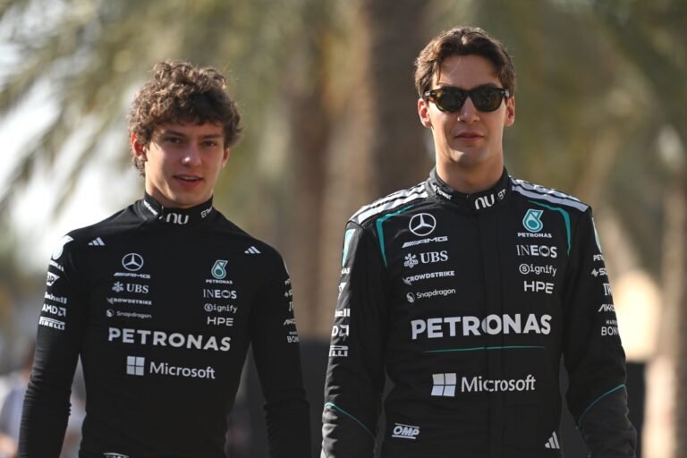 The Chinese Grand Prix in Shanghai features Formula 1 cars racing on the circuit, with a packed grandstand of enthusiastic fans cheering them on. The event is a showcase of speed, strategy, and technological innovation, with the primary focus on the Chinese Grand Prix.