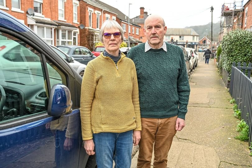 A car with numbers scrawled on it, highlighting the issue of vandalism and the importance of respecting others' property, with a focus on the primary keyword phrase car vandalism