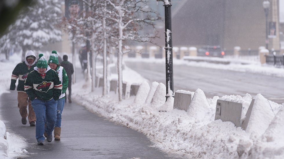 A dark and stormy sky with strong winds and heavy rain, posing a risk of tornadoes and damage to buildings and infrastructure, with the Met Office issuing warnings for severe weather