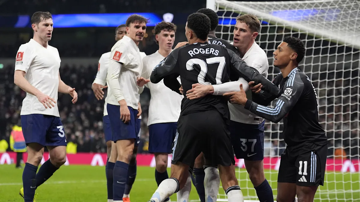FA Cup football match with players scuffling