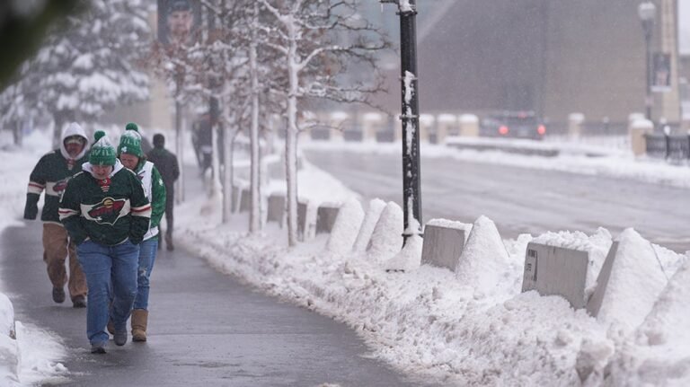 Severe storms bringing hazardous winds and heavy rain, with a tornado warning in the background, illustrating the primary keyword of severe weather