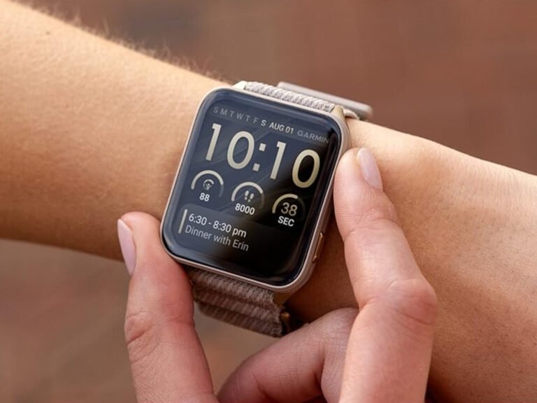 A person wearing a Garmin smartwatch with a new watch face, highlighting the limited rollout and exclusive designs available to certain devices, including the latest models and their vibrant colour schemes