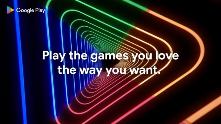 A person playing a game on their mobile device, with a PC in the background, illustrating the Buy Once, Play Anywhere feature that allows for seamless gaming across devices, enhancing the overall gaming experience with Google Play