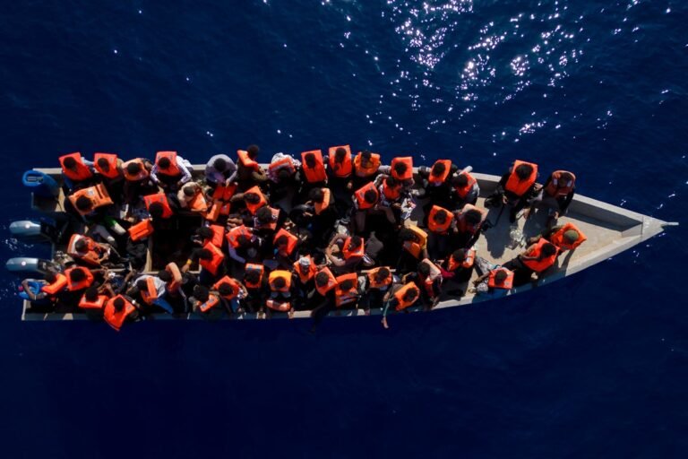 A descriptive image of a migrant shipwreck in the Mediterranean, with a focus on the primary keyword phrase 'migrant shipwrecks' and the devastating impact on human life, as migrants attempt to reach European shores in overcrowded and ill-equipped vessels