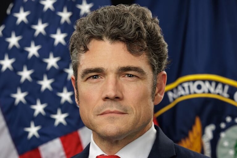 A sombre image of the US counterterrorism chief, with a faint image of the Iranian flag in the background, symbolising the complex and delicate nature of the situation, with the primary keyword counterterrorism