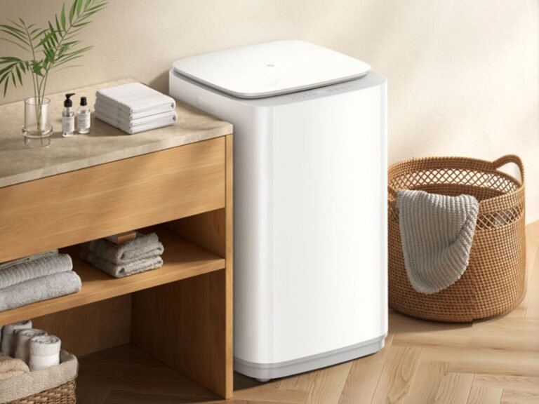 Xiaomi's Mijia Washing Machine Top-Loading 10kg features a compact, minimalist design with a colour touchscreen display, offering smart features and effortless connectivity, perfect for small households or those with limited space in the UK