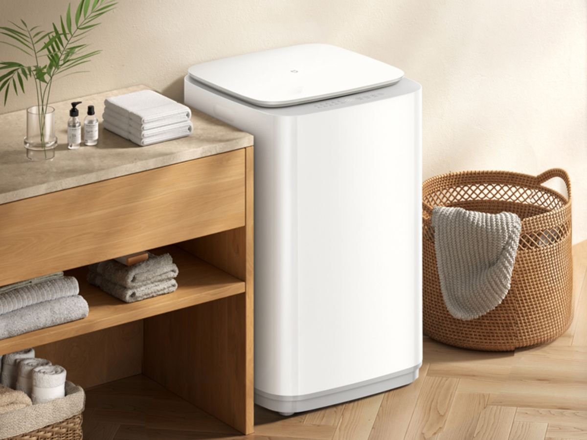 Xiaomi's Mijia Washing Machine Top-Loading 10kg features a compact, minimalist design with a colour touchscreen display, offering smart features and effortless connectivity, perfect for small households or those with limited space in the UK