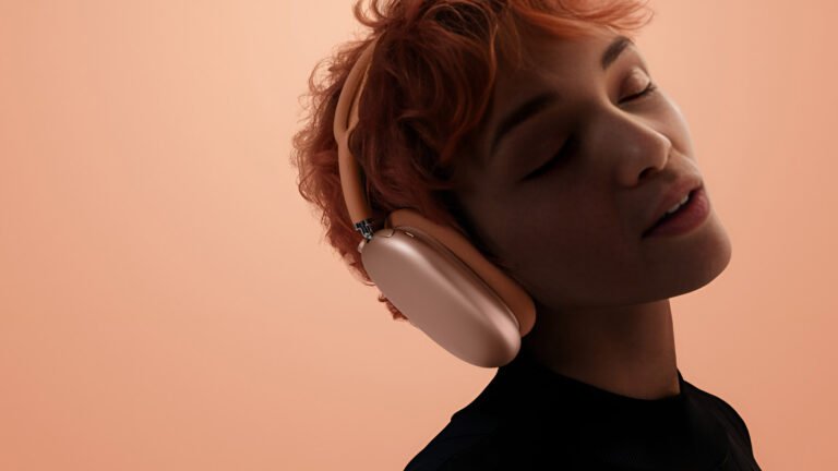 The new AirPods Max 2 wireless headphones, featuring a USB-C port and fresh colour options, available in the UK soon, with a focus on production efficiency and sustaining sales, rather than pushing the boundaries of innovation, with the latest technology and design
