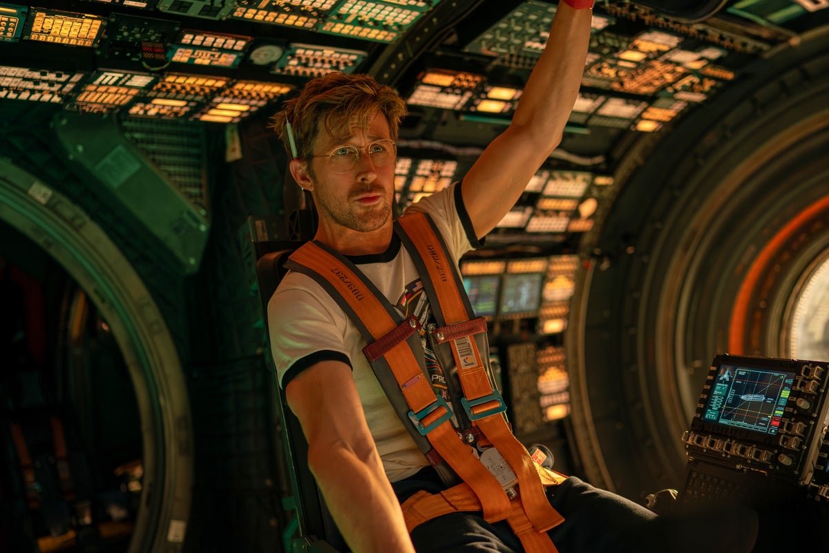 Ryan Gosling in a spacesuit, floating in space, with a stunning celestial background, showcasing the movie's theme of space exploration and the colour of hope in a desolate universe, with a focus on the primary keyword Project Hail Mary
