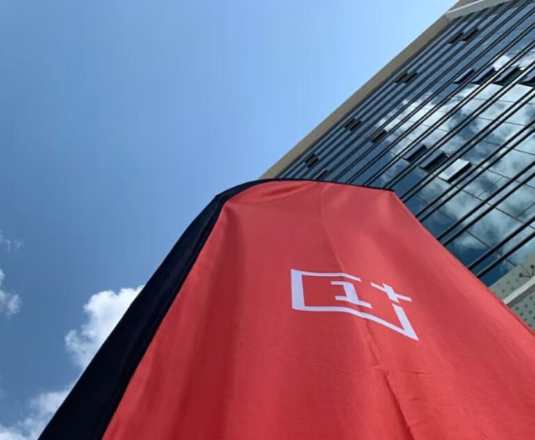 OnePlus logo on a smartphone screen with a cityscape in the background, symbolizing the company's global presence and potential exit from the US and European markets