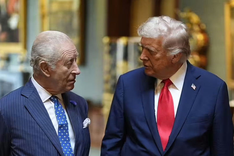 King Charles and Donald Trump at a formal event, with a caption describing the tension between them and the significance of the five-word remark