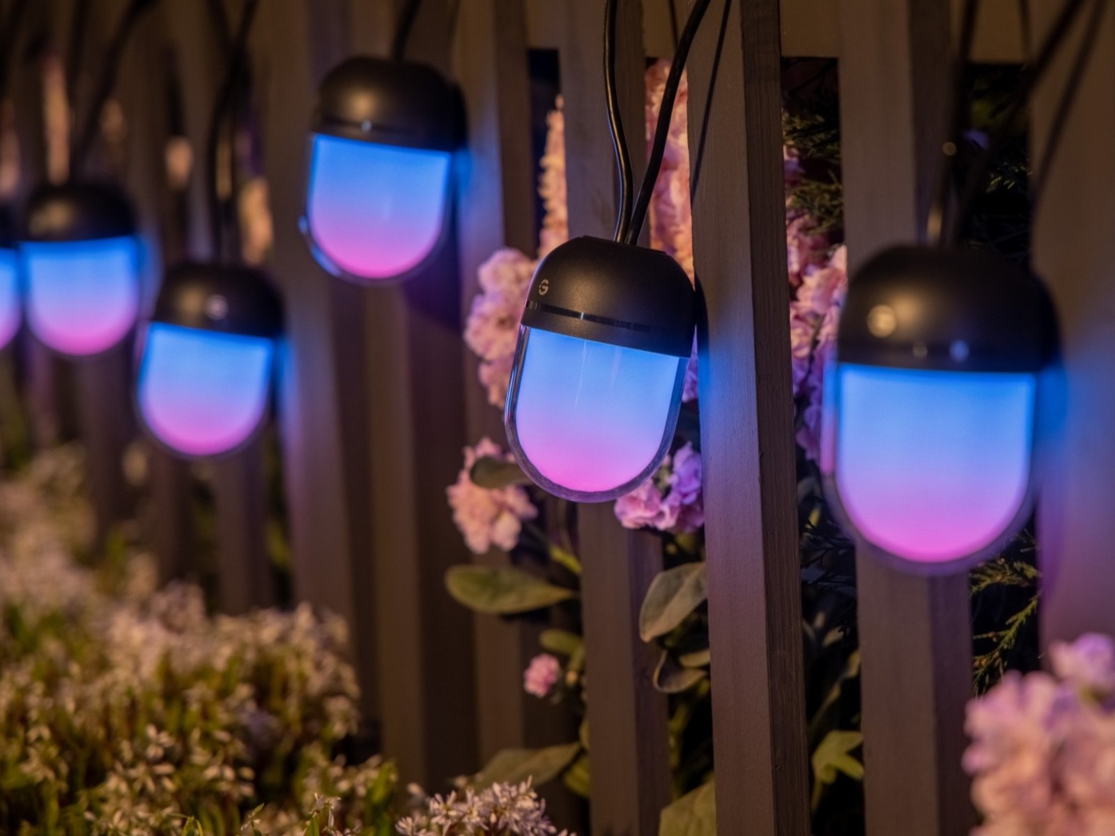 A close-up of the Govee Outdoor Chromatic String Lights, showing their large, multi-colour bulbs and waterproof design, perfect for illuminating your UK outdoor space