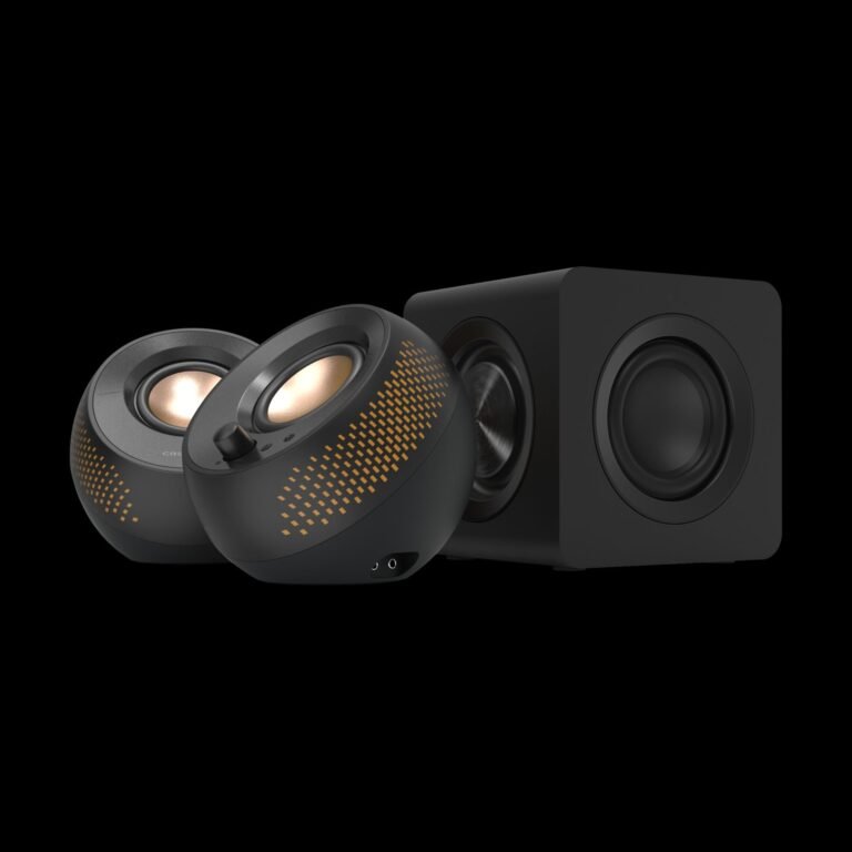 The Creative Pebble X Plus speakers, featuring a compact design and subtle RGB lighting, perfect for UK home offices and studies, offering immersive sound and advanced features, with a focus on compact speakers and UK audio solutions