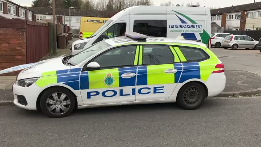 A cordon around Bowland Drive in Litherland, with police tape and officials present, highlighting the ongoing investigation and public safety measures in place, amidst the Litherland incident