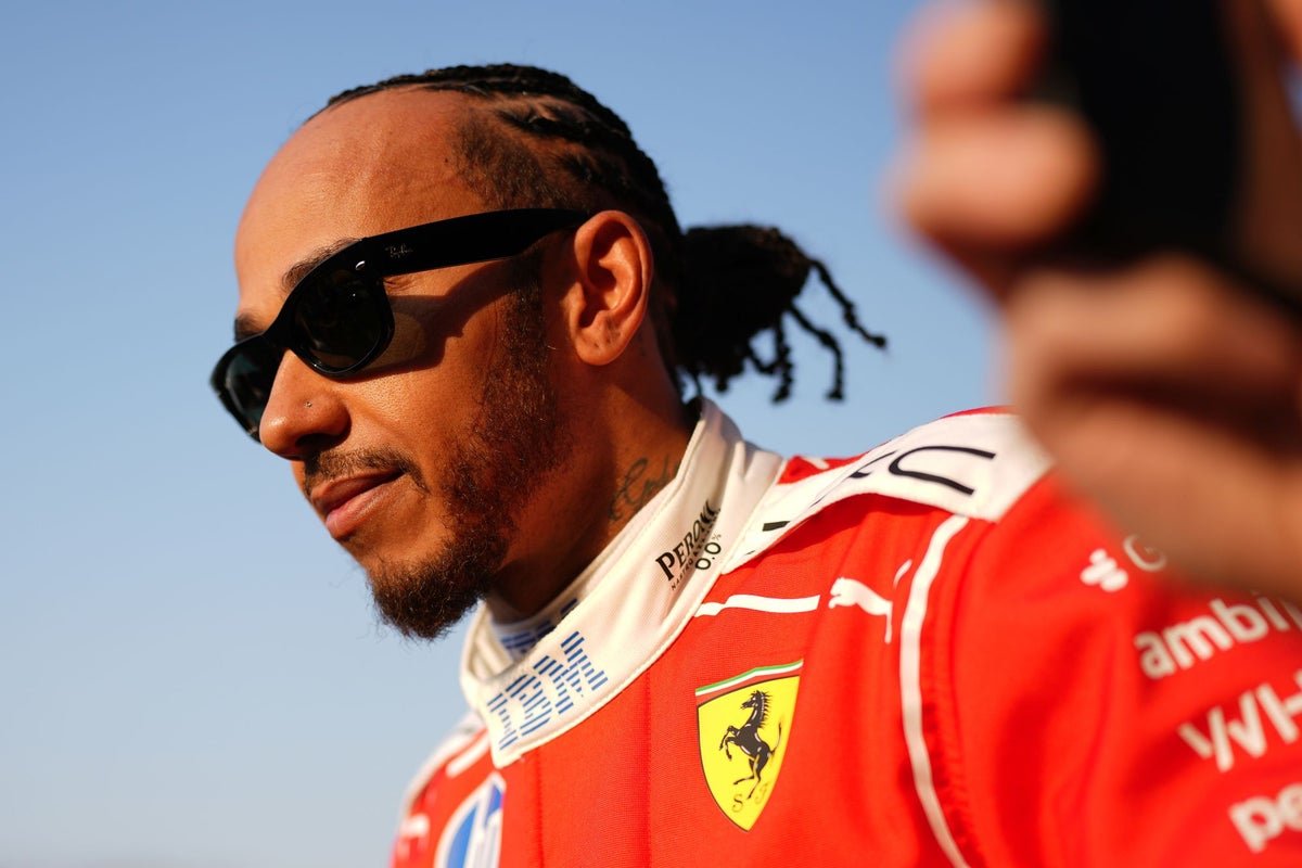 Lewis Hamilton in his F1 car, with a determined look on his face, amidst a Christmas Day backdrop, symbolising his bold decision that will impact the F1 season
