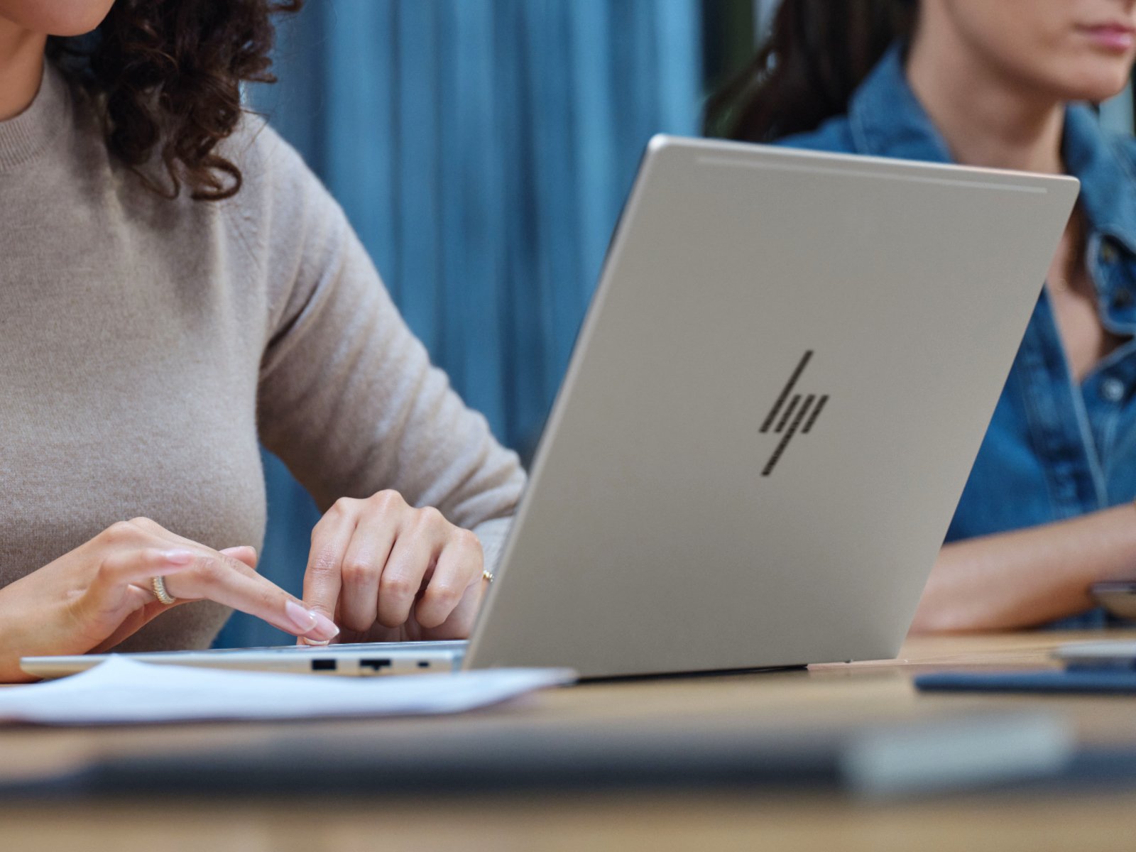 A close-up of the HP EliteBook 6 G2q's stunning OLED display, showcasing vibrant colours and exceptional viewing angles, with the Qualcomm Snapdragon X2 Elite processor and up to 64 GB of RAM