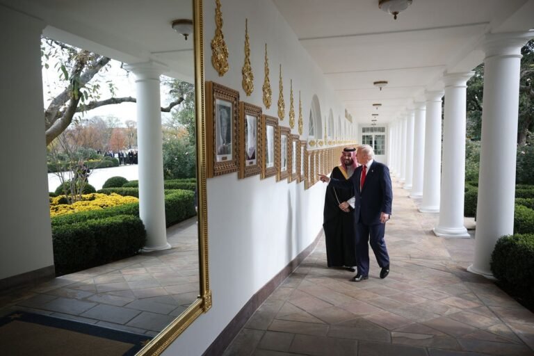The White House Oval Office walkway with new black flooring, a significant design change introduced by the Trump administration, featuring a sleek and modern look that is sure to generate interest and debate among architecture enthusiasts and design experts