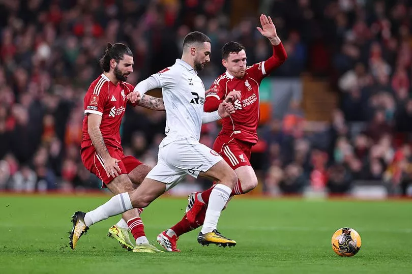 Adam Phillips in action at Anfield
