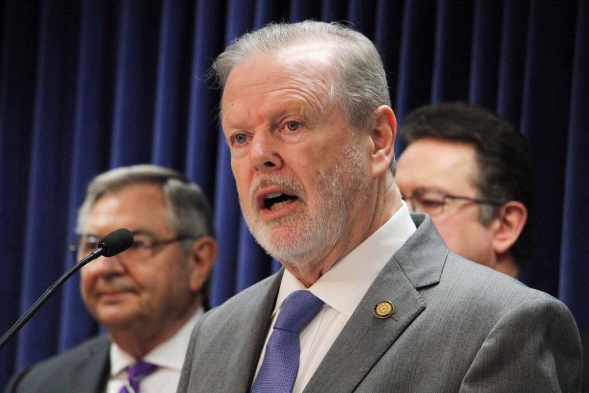 A dramatic image of a senator and a county sheriff standing side by side, with a subtle background of the North Carolina state flag, highlighting the unexpected election outcome and the significance of the county sheriff's victory in the state's political landscape, with a focus on the primary keyword phrase 'North Carolina senator'