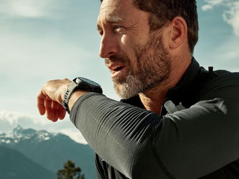 A person wearing a Garmin smartwatch, with a cityscape in the background, symbolising the improved cellular connectivity in urban areas, allowing for seamless music streaming, fitness tracking, and notification receipt on the go, with the UK's diverse landscapes and lifestyles in mind
