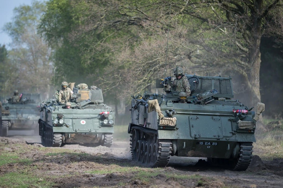 A photograph of a British army soldier in uniform, with a concerned expression, symbolising the army's depleted state and its inability to seize anything more than a small market town, with the primary keyword phrase 'British army depletion' naturally included