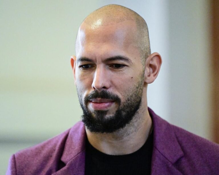 A descriptive image of a person in a suit, with a caption that reads: 'Investigation into police handling of Andrew Tate sexual abuse allegations, with a focus on transparency and accountability, and a primary keyword of Andrew Tate'