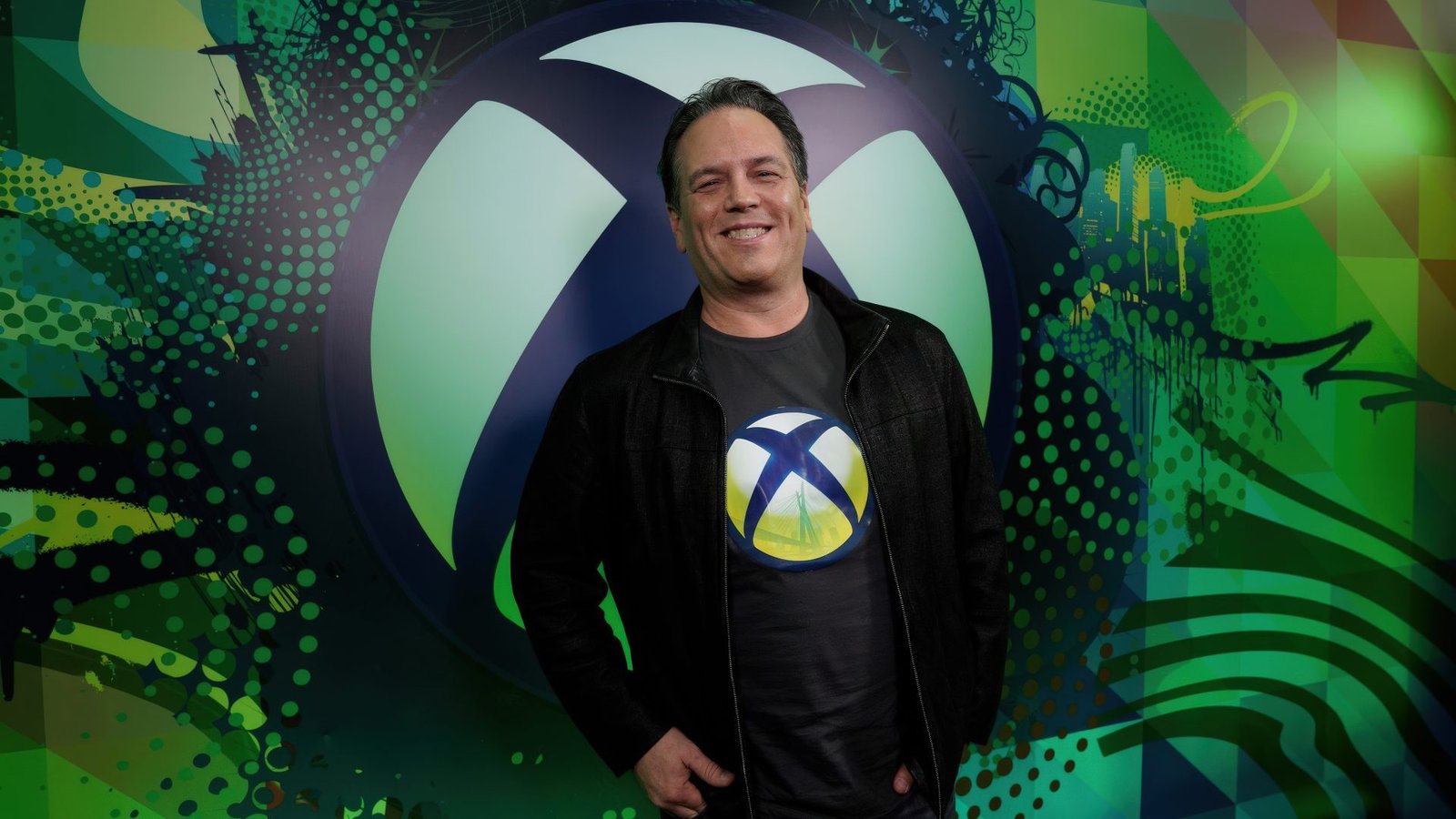 Phil Spencer, Microsoft Gaming CEO, receives the D.I.C.E. Lifetime Achievement Award in 2022, a testament to his enduring contributions to the gaming industry in the UK