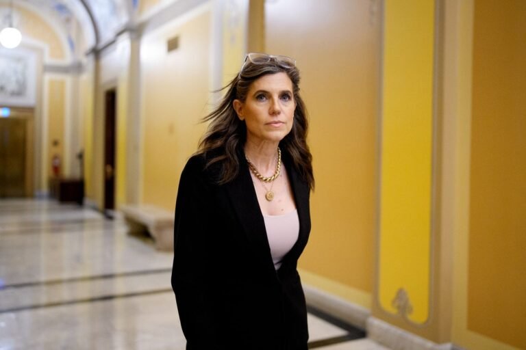 Nancy Mace exits a hearing room, surrounded by journalists, as tensions rise about the potential war with Iran, a country with a rich history and complex political landscape, where the war machine is a major concern
