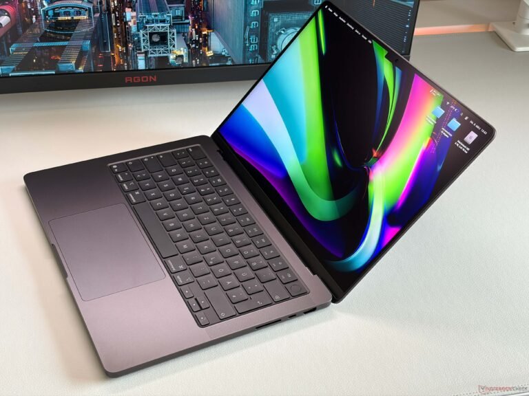 A close-up of the MacBook Pro 14's vibrant display, showcasing its exceptional colour accuracy and detail, ideal for professionals who require precise colour analysis and editing capabilities in the UK