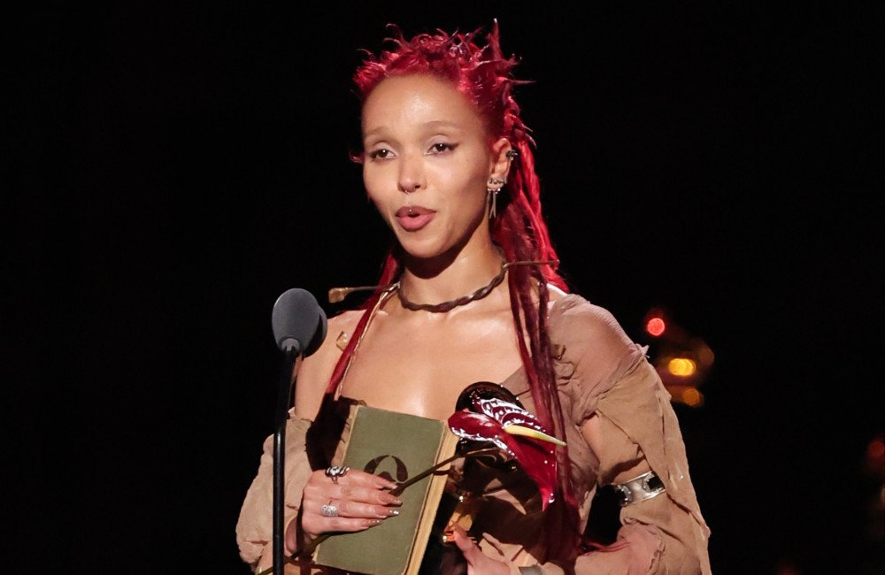 FKA Twigs is taking a stand against domestic abuse by suing her former partner Shia LaBeouf, the British singer-songwriter is using her platform to raise awareness about the importance of consent and healthy relationships, her courage and determination will undoubtedly inspire others to speak out and seek help, the colour of courage is often associated with the colour red, symbolising strength and bravery, FKA Twigs' decision to take action is a testament to her courage and determination