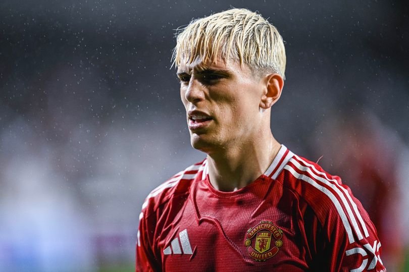 Alejandro Garnacho speeding away from Manchester United training ground in his car, with a concerned expression on his face, highlighting the importance of road safety and responsible behaviour