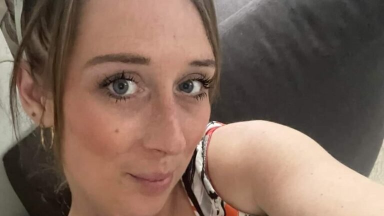 A young child holding a photo of their murdered mother, with a sombre expression, as the killer receives a whole-life term, highlighting the devastating impact of violent crime on families and communities