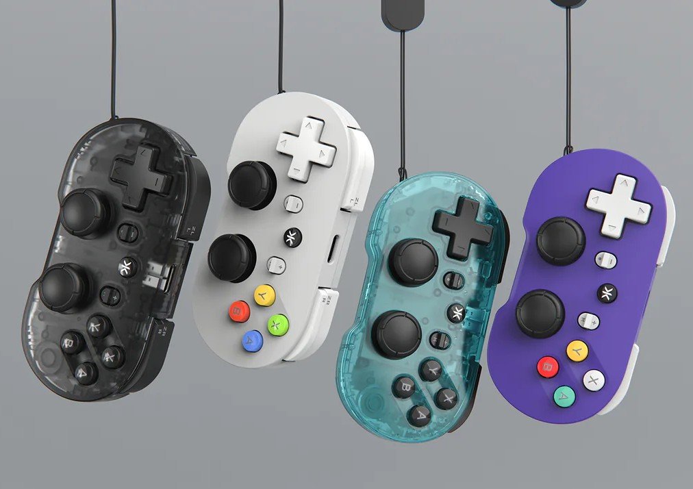 CRKD Unveils Atom+ Mini Controller in the UK 1 The CRKD Atom+ mini controller, featuring dual TMR thumbsticks and a compact design, perfect for portable gaming in the UK, with a sleek and modern aesthetic