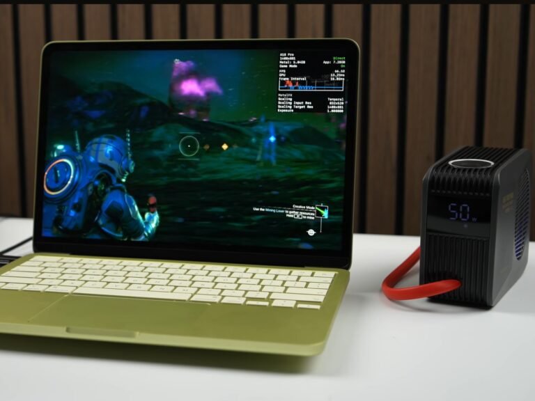 A close-up of a copper plate fitted inside a MacBook Neo, highlighting the innovative modification that enhances laptop performance and reduces temperature, a game-changer for UK tech enthusiasts