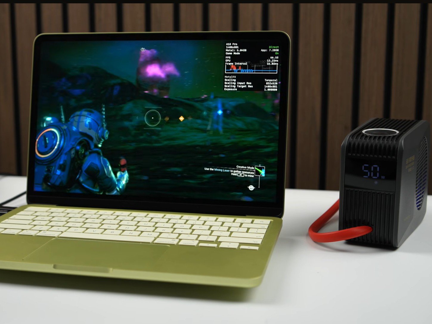 A close-up of a copper plate fitted inside a MacBook Neo, highlighting the innovative modification that enhances laptop performance and reduces temperature, a game-changer for UK tech enthusiasts