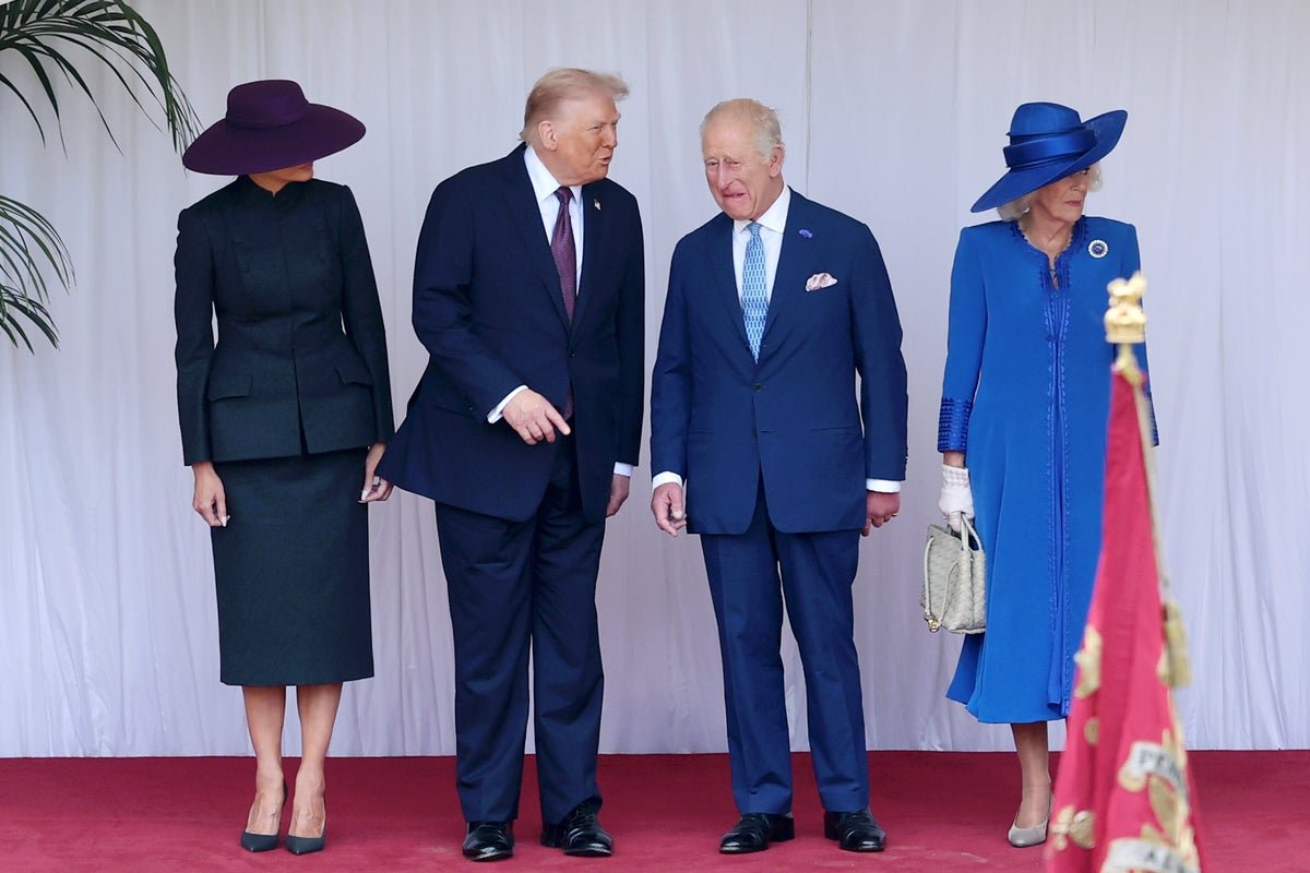 King Charles and Trump's ambassador to the UK shaking hands, symbolising diplomatic relations between the two nations, with a focus on the state visit and its potential cancellation